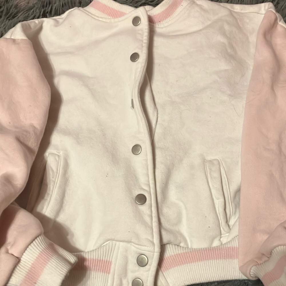 Pink and white varsity jacket M